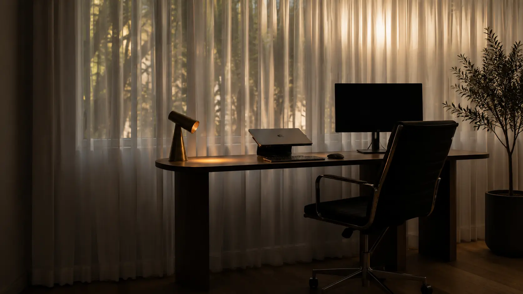Milieu lamp on a walnut desk in a daylit study