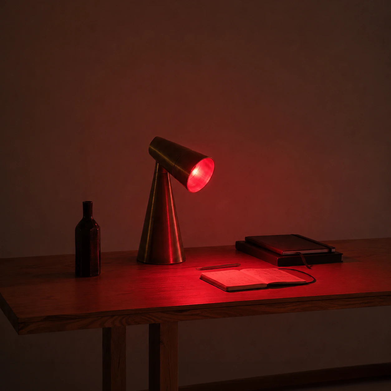 Milieu Table Lamp 001 with the articulated head angled down over a desk